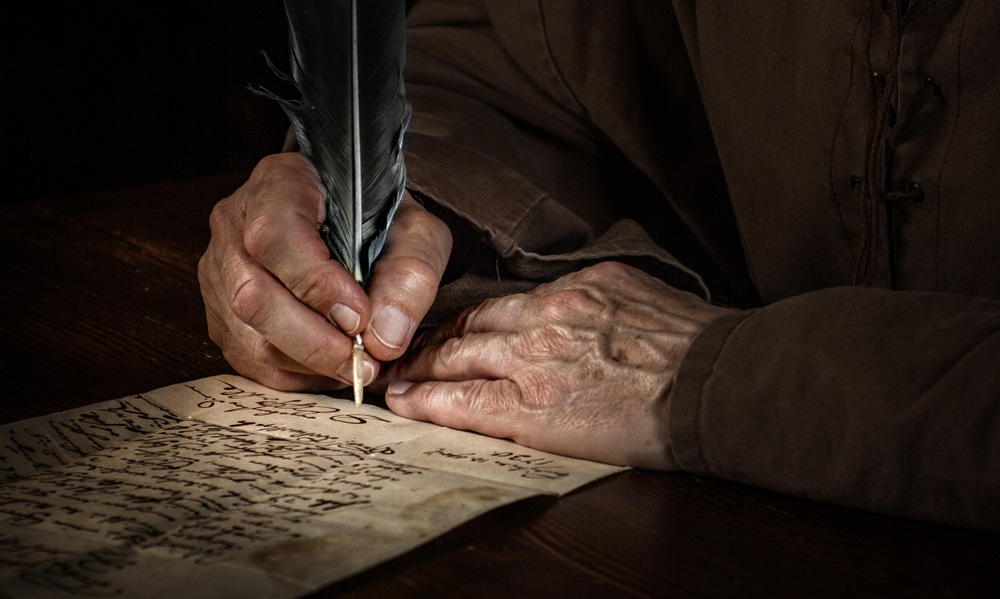 homme qui pratique l'écriture automatique